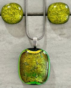 Sparkly yellow/green, pendant comes with a 16" silver plated snake chain with matching stud earrings Glass Necklace Pendant, Fused Glass Necklace, Green Pendant, Fused Glass Pendant, Glass Pendant Necklace, Glass Necklace, Glass Pendant, Snake Chain, Earrings Set