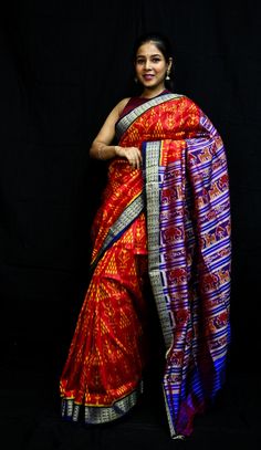 Weaver communities of Maniabandha and Nuapatana of Odisha traditionally weave this kind of saree. Common motifs are star, temple, conch, rudraksh, fish, chakra, lotus etc. The inspiration of all its designs comes from nature. It is the best of single ikat; one of warp and weft is tied and dyed prior to weaving. The borders and the pallas have tremendous variety and each one of them is attractive and praiseworthy. Specification:  Occasion: Festive Wear Fabric: Mulberry Silk,  Primary Color: Red S Traditional Pre-draped Saree For Ceremonies, Traditional Multicolor Pre-draped Saree For Navratri, Traditional Handloom Pre-draped Saree For Diwali, Pre-draped Saree With Traditional Patterns For Ceremonies And Festivals, Navratri Ikat Print Pre-draped Saree, Multicolor Ikat Print Pre-draped Saree For Navratri, Traditional Ikat Print Pre-draped Saree For Festivals, Navratri Ikat Print Red Sets, Red Ikat Print Festival Sets