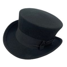 Edwardian top hat. You can make your hat with your favorite color by choosing it from my Wool felt color card. Made with short crown and embellished with a 50 millimeters wide grosgrain ribbon. Edwardian top hat ideal for everyday and special ocasions such as weddings, cocktails or parties. For man and woman.Measurements in centimeters are 32 x 27. Crown height 11. Brim length 6. These measurements may have some slight variation depending on the size of the hat.The end of the brim is reinforced Fitted Solid Brimmed Top Hat, Solid Fitted Brimmed Top Hat, Vintage Solid Color Felt Hat With Flat Brim, Winter Top Hat With Flat Brim, Classic Fitted Winter Hats, Fitted Winter Top Hat With Flat Brim, Winter Fitted Top Hat With Flat Brim, Vintage Solid Flat Brim Felt Hat, Classic Black Flat Cap Felt Hat