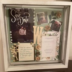 a framed photo with flowers and pictures on the wall next to a couple's wedding announcement