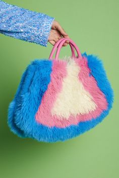 - Luxurious faux fur - Eye catching design - Larger tote style - 2 x grab handles - One size  15% Tencel 29% Bamboo 56% Modacrylic Faux Fur Bag, Crafted Bag, Fur Gloves, Fur Headband, Faux Fur Scarves, Hair Bobbles, Fur Bag, Feather Hat, Handcrafted Bags