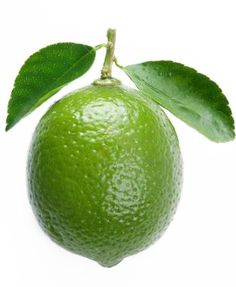 a lime with green leaves hanging from it