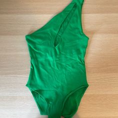 Green Zara One Shoulder Bodysuit With Cutout Across Chest. Cotton Material, Size Small. New With Tags! Solid Summer Bodysuit For Night Out, Solid Color Summer Bodysuit For Night Out, Green Stretch Summer Bodysuit, Chic Green Bodysuit For Summer, Chic Green Bodysuit For Spring, Chic Green Stretch Bodysuit, Chic Green Summer Bodysuit, Green One-piece Bodysuit For Party, Green Sleeveless Summer Bodysuit