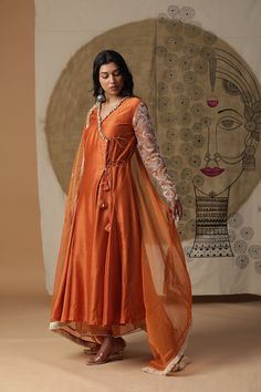 orange fusion wear in Chanderi silk. Perfect for semi and formal occasions. its light wear, comfortable fabric and fit. Orange Suits Women Indian, Orange Indian Outfit, Kurta Set For Wedding, Angrakha Suit, Mehndi Function, Suits 2023, Embroidery Kurti, Dori Work, Fusion Wear