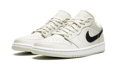 The Women’s Air Jordan 1 Low “Coconut Milk” is a women’s exclusive colorway of Michael Jordan’s first signature shoe in the popular low-top design that excels in versatility.  The “Coconut Milk” is a white-based look for the retro basketball shoe by Jordan Brand that features a Coconut Milk-colored leather upper with a black leather Swoosh.  The entire upper, including the perforated toe, mid-panel, collar, and heel is constructed in a creamy white hue that resembles the inside of a coconut.  A Jordan 1 Low Coconut Milk, 70s Converse, Wmns Air Jordan 1, Nike X Travis Scott, Retro Basketball Shoes, Low Air Jordan 1, Womens Air Jordans, Air Jordan Sneakers, Jordan 2