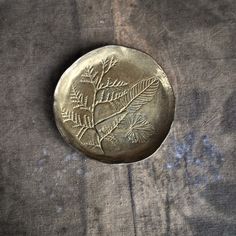 a small metal object sitting on top of a table