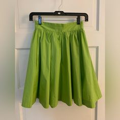 Nwt Trashy Diva High Waisted Green Circle Skirt With Pockets Sz 2 One Small Water Mark Where I Cleaned Up Some Surface Dirt, Should Come Out When Cleaned And Not Noticeable With The Fullness Of The Skirt 97% Cotton 3% Spandex Approximately 11.5” Waist 19” Long Non Smoking Home Green Flowy Cotton Skirt, Green Fitted Tiered Skirt, Green Flared Skirt With Elastic Waistband, Green Stretch Flared Skirt, Fitted Green Pleated Midi Skirt, Gathered Full Mini Skirt, Green Stretch Cotton Skort, Green Skirt With Elastic Stretch Waistband, Fitted Green Skirt With Elastic Waistband