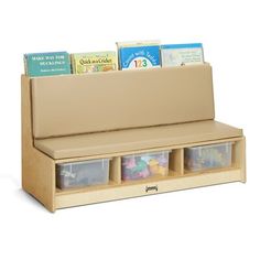 a wooden bench with three bins and books