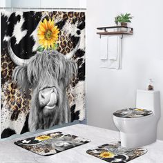 a black and white cow with a sunflower on it's head shower curtain set