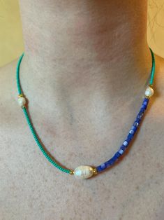 Beautiful asymmetrical beaded necklace made with beads sourced from Istanbul, Turkey. Necklaces made of  blue dyed shell beads, Freshwater pearls and teal green seed beads and finished with a gold color lobster claw closure. Perfect for adding charms and layering ❤️ PLEASE NOTE- I am currently traveling and won't be back in the states until the week of September 10, 2024. Any items purchased before then will not be shipped until AFTER Sep 11, 2024. THANK YOU FOR YOUR UNDERSTANDING. Handmade Beaded Necklaces, September 10, Shell Beads, Istanbul Turkey, Turquoise Beads, Teal Green, Teal Blue, Lobster Claw, Candy Cane