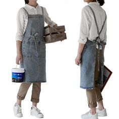 two women wearing aprons and holding buckets