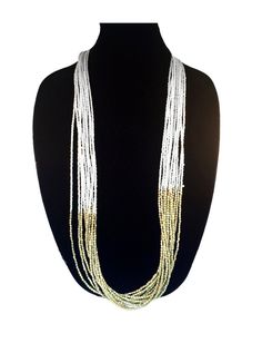 LONG AND LAYERING WHITE & GOLD NECKLACE This is a gorgeous multi-strand white and gold beaded necklace . The beading is done all by hand and took around a week and a half to complete. This necklace also includes a lobster hook for easy closure **The Necklace is 35 inches in length Thank you for your appreciation. All jewelry comes in gift boxes or gift bags Go back to Storefront Taneesijewelry.etsy.com View my Entire STERLING SILVER EARRINGS Collection at https://www.etsy.com/shop/taneesijew White Elegant Multi-strand Layered Necklace, Elegant White Multi-strand Layered Necklace, White Long Necklace With Colorful Beads, Long White Necklace With Colorful Beads, Handmade Long White Necklace, White Double Strand Beaded Chain Necklace, White Double Strand Necklace With Beaded Chain, White Bohemian Jewelry With Round Beads, Gold Multi-strand Beaded Necklaces With Faceted Beads