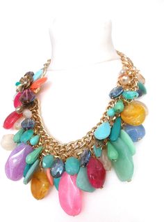 Chunky, acrylic bead statement necklace from Olivia Divine. Chunky, gold tone chain embellished with large and small acrylic beads, and floral detailing. Adjustable length. Handmade and unique design. Perfect for holidays and special occasions. Multicolor Costume Jewelry Chain Necklace For Party, Multicolor Chunky Chain Necklace For Party, Luxury Colorful Beads Statement Jewelry, Luxury Multicolor Necklace With Large Beads, Luxury Multicolor Statement Beaded Necklace, Luxury Hand-strung Statement Beaded Necklace, Luxury Statement Multi-strand Beaded Necklace, Handmade Statement Necklace, Beaded Statement Necklace