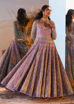 Looking for a versatile ethnic wear then go for the aqsa anarkali gown which is every bit regal. It has mirror work combined with hand embroidery and floral motifs that give an appearance of a walking diva to the wearer. To make it one of a kind, the attire has tassels at its back with sleeves made out of sheer fabric. Anarkali Gown With Intricate Embroidery, Multicolor Dabka Work Gown For Eid, Multicolor Dabka Work Dresses For Reception, Multicolor Dresses With Dabka Work For Reception, Semi-stitched Multicolor Gown With Dabka Work, Multicolor Semi-stitched Gown With Dabka Work, Floor-length Multicolor Anarkali Set With Intricate Embroidery, Multicolor Anarkali Gown With Intricate Embroidery, Multicolor Anarkali Set With Intricate Embroidery