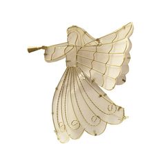 a glass angel ornament hanging on a white wall in the shape of a bird