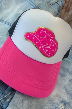 This stylish Cowboy Hat Western Trucker Hat is the perfect accessory to make a statement! With its pink and black western design, it adds the perfect touch of fun and flair to any outfit. It's comfortable to wear for any occasion, whether you're having a night out or out in the sun on a sunny day! Adjustable snap-back. Trendy Pink Brimmed Hat, Trendy Pink Brimmed Mini Hats, Trendy Brimmed Hat For Rodeo, Pink Brimmed Hat One Size, Trendy Adjustable Brimmed Trucker Hat, Trendy Pink Bucket Hat, Trendy Festival Mini Cap Hats, Trendy Mini Cap Hats For Festivals, Trendy Trucker Hat For Festivals