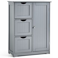 a gray cabinet with three drawers on the bottom and one door open to reveal its contents