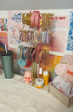 there are many bracelets hanging on the wall