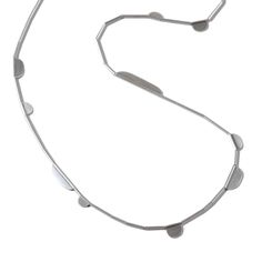 a metal necklace is shown on a white background