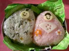 there are two rice cakes with faces on them