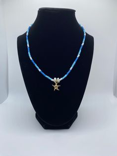 This necklace is beach themed. Its made with light blue and dark blue seed beads, white rock beads, and a starfish pendant charms. I can make it with gold or silver chain. There is also matching earrings in other listings. Starfish Pendant, White Rock, Summer Necklace, Beach Themed, Beach Vibes, Beach Vibe, Summer Jewelry, Blue Dark, Necklace Designs