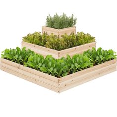 three wooden planters filled with plants on top of each other