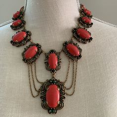 An Intricate And Substantial Victorian Revival Necklace And Bracelet From The 1950s. Each Of The Five Different Size Medallion Links Are Beautifully Cast In Detail And Patinated For An Antique Gold Finish. Additionally, They Are Set With A Large Oval Coral Glass Coral Cabochon Flanked With A Green Glass Cabochon Above And Below. The Largest Medallion Front Pendant Is 1.5 Inches Wide, 2 Inches High And .75 Of An Inch Deep. T Victorian Era Jewellery, Glass Coral, Jewelry Victorian, Victorian Revival, Necklace And Bracelet, The 1950s, Victorian Era, Green Glass, Gold Finish