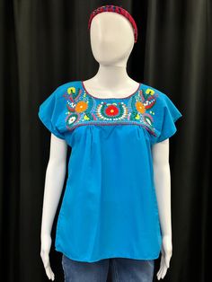 Beautiful embroidered Mexican top for special ocassions or daily wear. Casual Embroidered Cotton Blouse, Casual Cotton Embroidered Blouse, Casual Cotton Blouse With Embroidery, Crew Neck Blouse With Floral Embroidery, Fitted Embroidered Short Sleeve Top, Embroidered Crew Neck Blouse, Fitted Embroidered Top With Short Sleeves, Spring Short Sleeve Blouse With Tonal Embroidery, Embroidered Fitted T-shirt For Spring