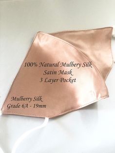 "Every Layer of this mask is 100% mulberry Silk Grade 6A 19mm FACTS TO KNOW about your Silk or Satin Mask - Are you buying a silk or satin mask? Silk is far superior to satin in quality and benefits. Our Mask is 100% Mulberry Silk. All 3 layers of our mask are made with Mulberry Silk. - SENSITIVE SKIN and ALLERGIES ? Our Mulberry Silk Mask is a hypoallergenic, natural fiber that is agreeable with people who suffer from allergies and have sensitive skin. Mulberry Silk is also moisture-wicking fab Elegant Mask, Luxury Mask, Rose Gold Satin, Metal Mask, Silk Mask, Natural Face Mask, Silk Face Mask, Silk Satin Fabric, Skin Mask