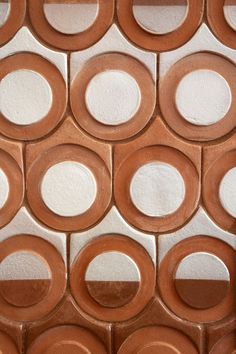 a close up view of some circles on a wall