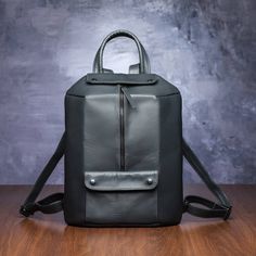 This dark grey leather fashion backpack was focused on geometric forms, so it can be elegant top handle bag or stylish everyday backpack, weared like laptop, college, book bag, also t it can be perfect essentials bag and style detail for your leisure, travel, meeting with friends or shopping.  #darkgreyleatherbackpack #womensrucksack #geometricbag #zipperbackpack #fashionbackpack #elegantbag #tophhandlebag #laptopbag Anti-theft Leather Backpack, Modern Leather Bags With Anti-theft Features, Modern Leather Anti-theft Bags, Modern Anti-theft Business Bags, Modern Anti-theft Backpack, Modern Anti-theft Shoulder Bag For Daily Use, Anti-theft Leather Bag Rectangular, Anti-theft Leather Business Bags, Business Leather Bags With Anti-theft Features