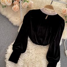 This shirt is perfect for those who are looking for a new shirt for a good price. It is fashionable, stylish, and it will look great on anyone who wears it. Do you wanahavit? Woman Blouse Fashion, Tops Korean, Female Tops, Velvet Blouse, Patchwork Shirt, Ladies Shirts, Velvet Shirt, Velvet Blouses, Gold Velvet