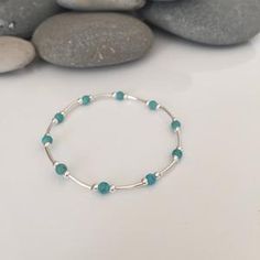 Chunky Turquoise Bracelet with Pave Diamond Bead Turquoise | Etsy Turquoise Bracelet With Silver Beads, Adjustable Turquoise Bracelet With Polished Beads, Turquoise Beaded Bangle With Natural Stones, Turquoise Bangle Beaded Bracelets With Natural Stones, Turquoise Bracelet With Polished Beads As Gift, Turquoise Bangle With Natural Stones, Turquoise Spacer Beads Bangle Jewelry, Turquoise Bangle With Spacer Beads, Turquoise Beaded Bracelets With Silver Beads