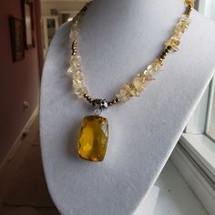 No Longer Available. Huge Faceted Citrine Gemstone Pendant In Sterling From India. I Surrounded It With Natural Citrines And Gold Hematite For A Knockout Statement Necklace. $96. 16" Long. Raw Citrine Necklace, Sterling Silver Choker, Silver Choker Necklace, Citrine Pendant, Citrine Necklace, Silver Choker, Citrine Gemstone, Chip Beads, Gemstone Necklace