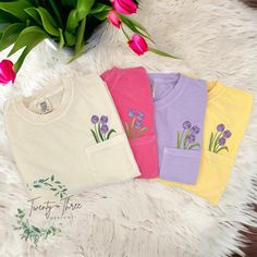 These embroidered floral pocket tees make the perfect Spring/Summer shirts! Check out our page for these shirts in more colors! if you don't see a color you want please message and we can discuss other options.  **shirt colors may vary slightly from shirt to shirt depending on dye. please use the color chart in the last picture for a truer color** ORDERING & SHIPPING *Your item will be shipped within 5-7 business days. *Please allow 2-5 business days to receive your item, more time may be necess Spring T-shirt With Pockets And Relaxed Fit, Spring Relaxed Fit T-shirt With Pockets, Relaxed Fit T-shirt With Pockets For Spring, Tulips Color, Embroidered Wildflowers, Embroidered Tulips, Tulip Colors, Pocket Tees, T-shirt Broderie