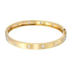 A classic! This beautiful 14k gold bracelet is studded with baguette diamonds all the way around. Use it as the starting point to an amazing stack of bracelets. This bangle comes as standard in a 6.5" size - other sizes are available to order. SKU: BG0100177 Total diamond weight: 0.80ct 14k gold - available to order in rose, white and yellow. Modern Diamond Bracelet With Baguette Cut Accents, Modern Baguette Cut Diamond Bracelet With Accents, Classic Bangle With Baguette Cut Diamond Accents, Classic Bangle With Baguette Diamonds Cut, Diamond Accents Baguette Cut Bangle, Diamond Baguette Cut Bangle With Accents, Elegant Bangle With Baguette Cut Diamonds, Gold Bangle With Baguette Diamonds, Anniversary Baguette Cut Diamond Bangle