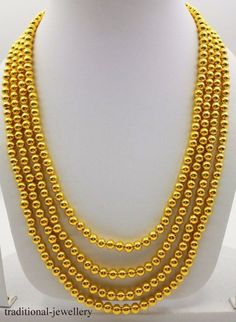 20 karat gold design handmade necklace chain, fabulous gifting jewelry for unisex from Rajasthan India.weight-43.5 grams approx.metal-20 karat yellow gold.brand-handmade.length- 18 inch to 22 inch slop pattern and can be adjusted by back thread or knotwidth-5 mm approx.there is wax inside the ballscondition-excellent brand new jewelry.contact for customization in length.note-gold jewelry is handmade designer jewelry so there can be slight difference in comparison of article and description. Gold Jewelry With 108 Round Beads, Gold Temple Necklace With Round Beads For Festivals, Gold Mala With Round Beads For Festivals, Gold Temple Necklace With Round Beads, Yellow Gold Temple Necklace With Round Beads For Festivals, Gold Polished Beads Mala For Wedding, 22k Gold Round Beads Yellow Necklace, Yellow 22k Gold Necklaces With Round Beads, Gold Temple Jewelry Mala With Round Beads