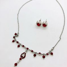 Vintage Modern Ruby Red Rhinestone Necklace & Earrings. Silver Tone. Swarovski Crystal Ruby Rhinestones Both Are Unsigned. Brand New Hypoallergenic Silver 925 Backings Have Been Added And Earrings Will Arrive Cleaned And Ready To Wear. Start A Bundle To Save On Shipping. Red Rhinestones Jewelry Sets For Party, Red Crystal Jewelry With Rhinestones, Red Crystal Rhinestone Jewelry, Red Crystal Jewelry Sets For Valentine's Day, Red Metal Jewelry With Rhinestones, Red Rhinestone Jewelry Sets As Gift, Red Rhinestone Jewelry Sets For Gifts, Red Crystal Jewelry With Matching Earrings, Red Metal Jewelry Sets For Party