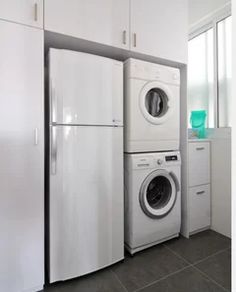 a washer and dryer in a small room