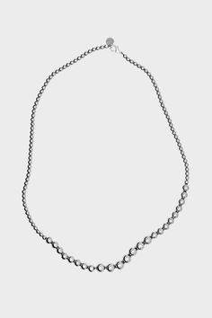 Inspired by heirloom pearl necklaces passed down from our beautiful grandmothers, the silver Olivia Necklace is a timeless piece, wearable for all seasons with three sizes of beads in an asymmetric array. Perfectly minimalist as a statement piece for a night out or for a quiet luxury moment with a tailored jean and blouse.Founded by model twin sisters Amalie and Cecilie Moosgaard in Copenhagen late 2021, LIÉ STUDIO creates stunning jewelry through the lens of timeless fashion aimed to elevate an Olivia Necklace, Cecilie Moosgaard, Daily Uniform, Pearl Necklaces, Quiet Luxury, Twin Sisters, Stunning Jewellery, New Arrival Dress, Wedding Shop