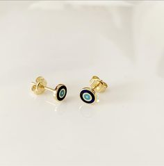 Made with 925 sterling silver and enamel 5mm in diameter Comes with the thick gold layer of your choice Hand finished by artisans Gift box included Artisan Gift Box, Enamel Stud Earrings, Tiny Studs, Navy Gold, Small Earrings Studs, Tiny Stud Earrings, Silver Gifts, Dainty Earrings, Gold Earrings Studs