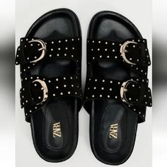 New With Tag Zara 2024 Collection Flat Leather Sandals. Wide Straps With Adjustable Buckles. Exterior Stud Detail. Round Toe. Sole Height: 1 Inch (2.5 Cm) Black | 2619/210 Upper 100% Cow Leather Lining 100% Goat Leather Sole 100% Sbs Insole 100% Goat Leather Trendy Leather Footbed Sandals With Textured Footbed, Trendy Suede Sandals With Round Toe, Chic Flat Footbed Sandals With Buckle Closure, Casual Suede Sandals For Party, Trendy Leather Sandals With Textured Footbed, Black Suede Summer Sandals, Chic Footbed Sandals With Buckle Closure And Flat Heel, Black Suede Sandals For Summer, Black Suede Sandals With Textured Footbed