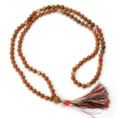 Jasper and Rudraksha 8mm Knotted Mala with Silk Tassel Approx 44" long including 3 1/4" tassel. Strung and knotted on silk cord Bead size : 8mm Adjustable Spiritual Tassel Necklaces, Spiritual Tassel Necklaces With Adjustable Fit, Adjustable Hand Knotted Mala For Meditation, Traditional Adjustable Hand Knotted Mala, Gift Brown Hand Knotted Mala, Traditional Adjustable Hand-knotted Mala, Brown Hand Knotted Mala As Gift, Brown Hand-knotted Mala As Gift, Adjustable Hand Knotted Round Beads Mala