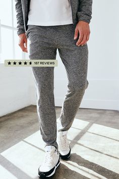 These men's performance joggers feature our ultra-soft Flowknit fabric. Featuring a slim but easy fit with the perfect amount of stretch for ultimate comfort. Guaranteed to be your new everyday pant.  | Quince | Men's Super Soft Performance Pants in Heather Grey, Flowknit Activewear, Recycled Polyester, Size XL Athleisure Elastane Pants With Side Pockets, Athleisure Elastane Pants With Pockets, Athleisure Pants With Side Pockets, Elastane, Athleisure Pants With Pockets, Athleisure Pants With Side Pockets Made Of Elastane, Relaxed Fit Elastane Workout Pants, Workout Pants Relaxed Fit In Elastane, Relaxed Fit Workout Pants Made Of Elastane, Relaxed Fit Straight Leg Activewear With Pockets