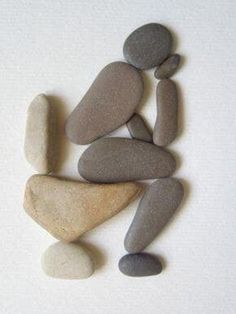 several rocks arranged in the shape of a person