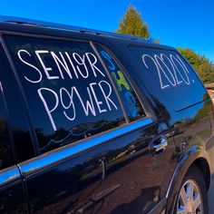 a black car with writing on the side of it that says senior power and secondary power