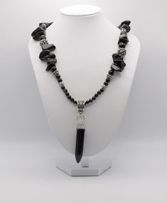 Elegant Black Beaded Necklaces With Stones, Adjustable Hematite Necklace With Black Beads, Black Onyx Crystal Necklace With Black Beads, Black Crystal Necklaces With Round Natural Stones, Black Necklaces With Round Natural Stones, Black Gemstone Crystal Necklace For Spiritual Use, Black Spiritual Crystal Necklace With Gemstone, Spiritual Black Jewelry With Polished Beads, Spiritual Black Crystal Necklace With Gemstone