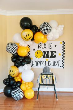 a birthday party with balloons and smiley faces on the wall, along with a sign that says pep is one happy dude