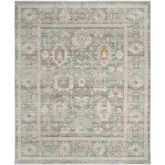 a gray and beige rug with an ornate design