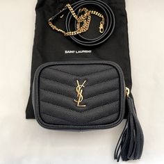 Authentic Saint Laurent Crossbody Bag New With Dust Bag Rare Color: Dark Blue With Gold Hardware Note: Last Photo To Show Length & Size 100% Calfskin Dimensions: 12 X 8,5 X 4 Cm / 4.7 X 3.3 X 1.5 Inches Shoulder Strap Drop: 52 Cm / 20.4 Inches Gold-Toned Metal Hardware Zip Closure Interior: One Main Compartment Luxury Belt Bag With Top Handle, Luxury Travel Belt Bag With Dust Bag Included, Luxury Belt Bag With Gold-tone Hardware For Daily Use, Luxury Crossbody Belt Bag For Shopping, Elegant Shoulder Belt Bag For Shopping, Trendy Bags With Gold-tone Hardware For Everyday Luxury, Elegant Belt Bag With Removable Pouch For Shopping, Luxury Belt Bag With Gold-tone Hardware, Designer Belt Bag With Gold-tone Hardware For Travel